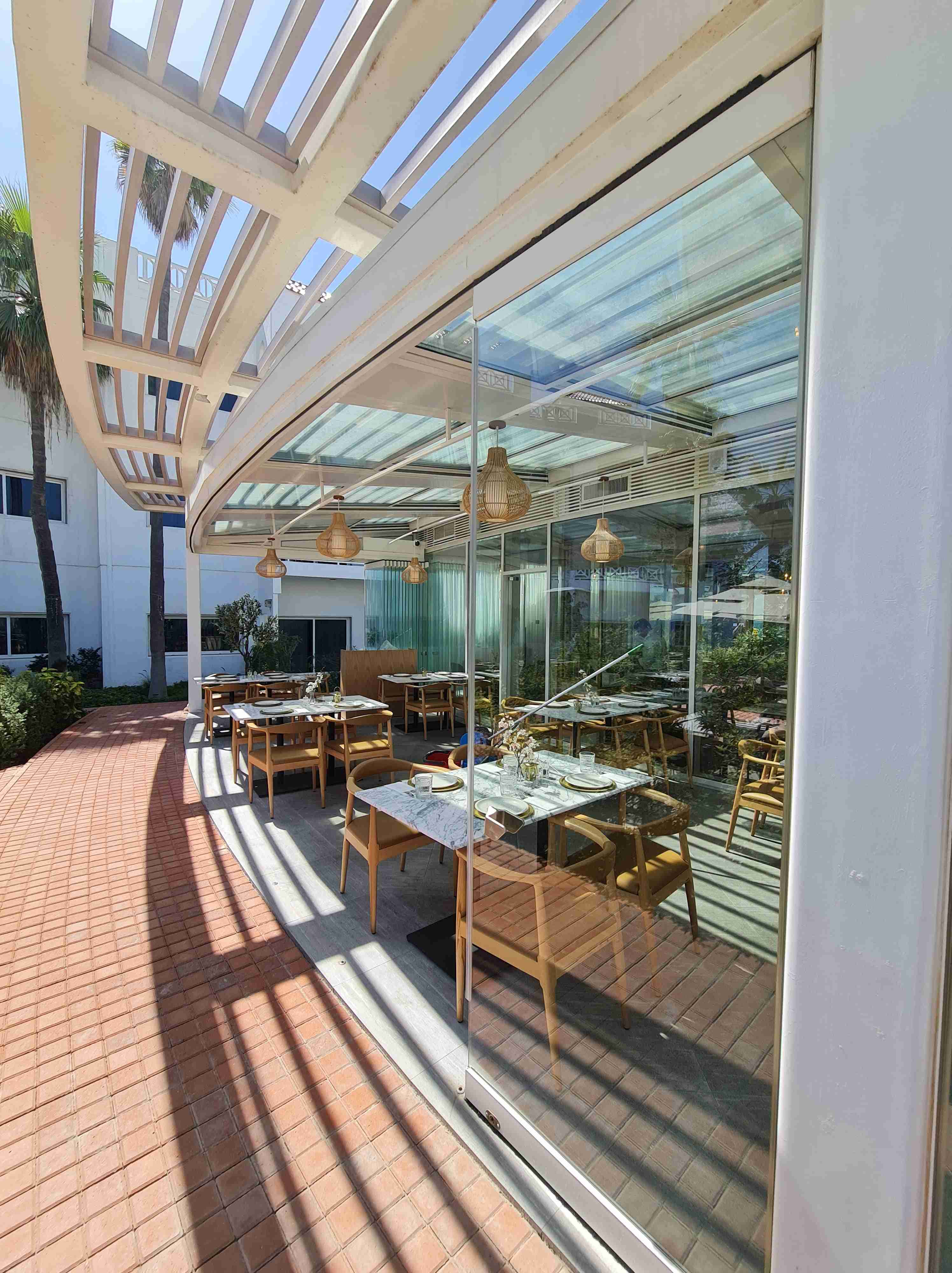 commercial frameless folding glass wall system